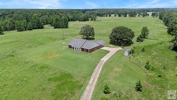 32 Acres of Recreational Land with Home for Sale in New Boston, Texas
