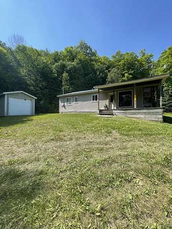 40 Acres of Recreational Land with Home for Sale in Hulbert, Michigan