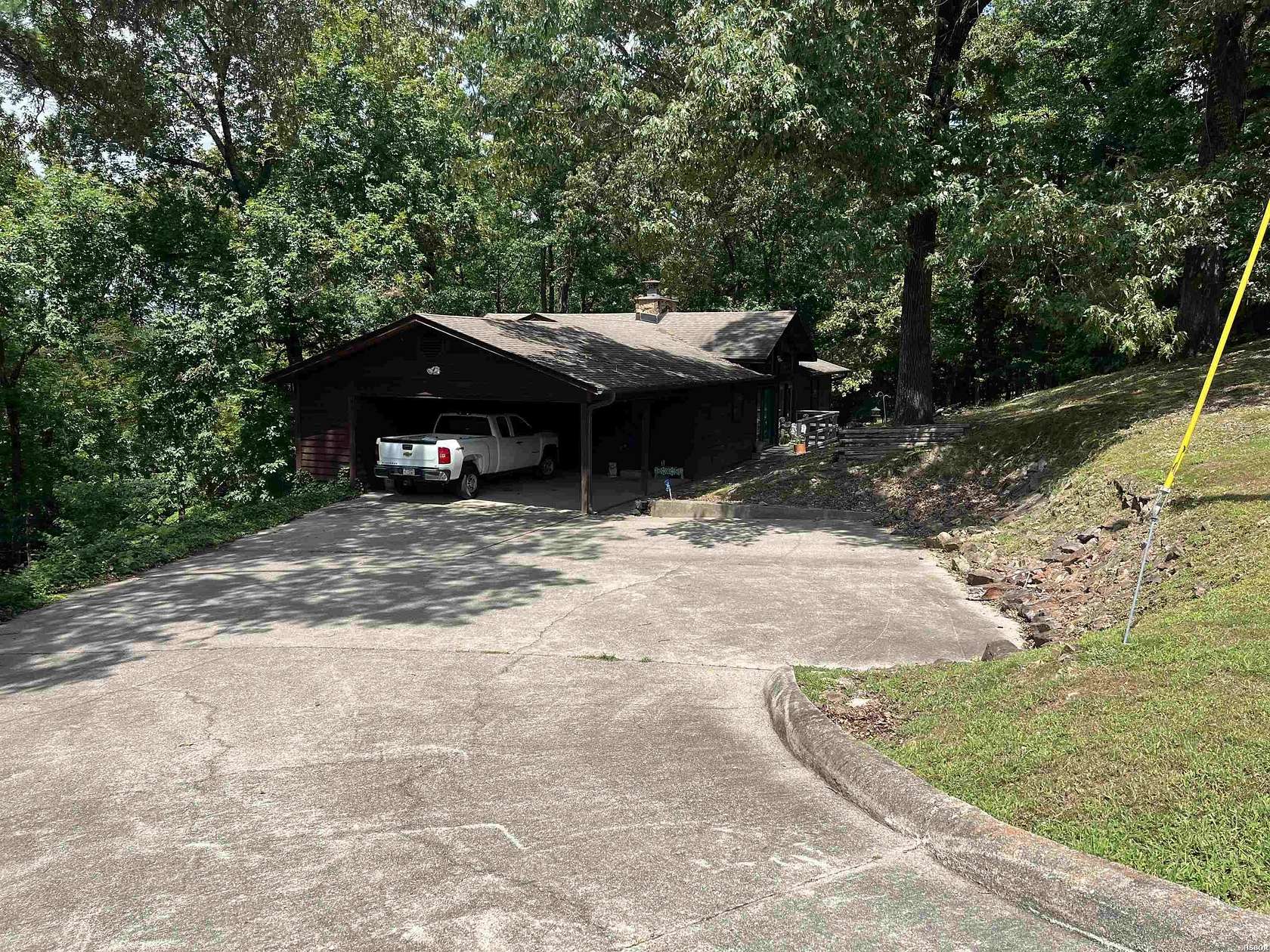 1.57 Acres of Land with Home for Sale in Glenwood, Arkansas