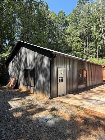 11.4 Acres of Land with Home for Sale in Fairmount, Georgia