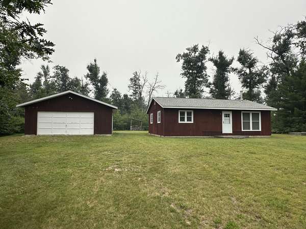 10 Acres of Recreational Land with Home for Sale in Lewiston, Michigan