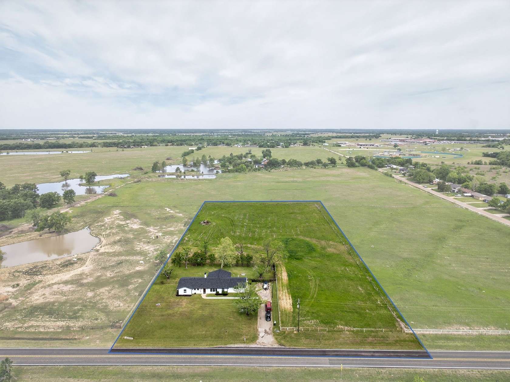 3.85 Acres of Land with Home for Sale in Wills Point, Texas