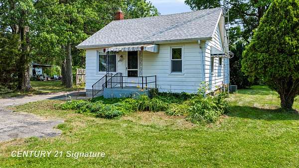 1.5 Acres of Land with Home for Sale in Flushing, Michigan