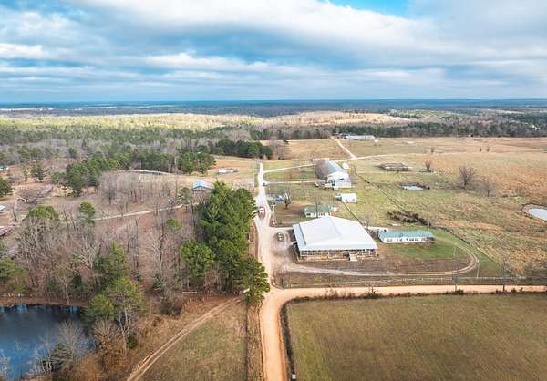 53 Acres of Land with Home for Sale in Raymondville, Missouri