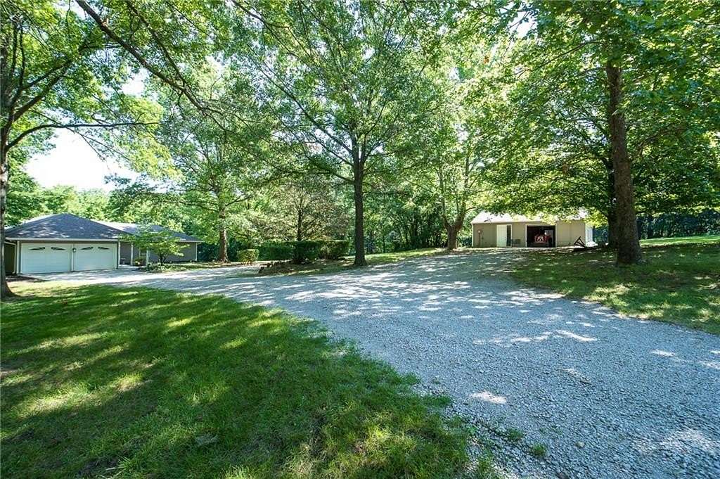 9.5 Acres of Land with Home for Sale in Lee's Summit, Missouri