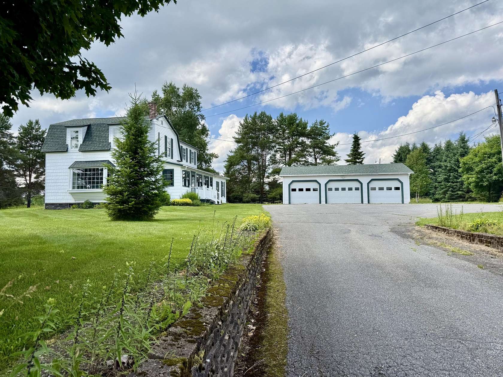 12 Acres of Land with Home for Sale in Caribou, Maine