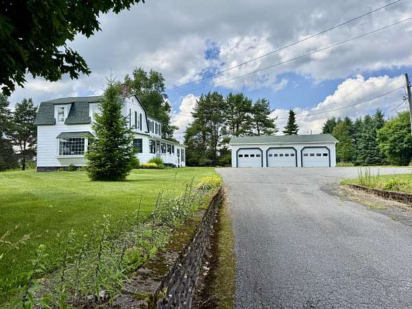 12 Acres of Land with Home for Sale in Caribou, Maine