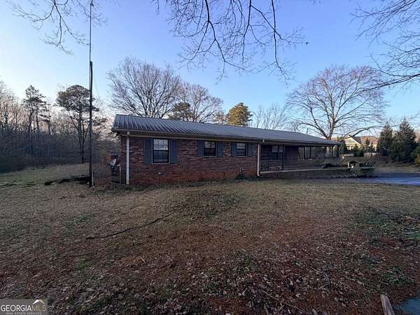 1.5 Acres of Land with Home for Sale in Commerce, Georgia