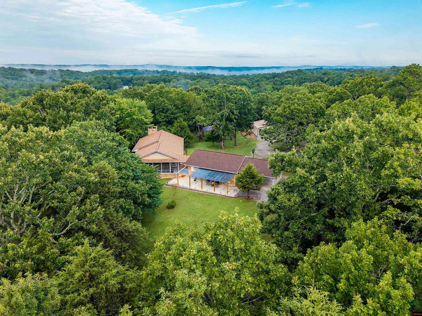 5.17 Acres of Land with Home for Sale in Mountain Home, Arkansas