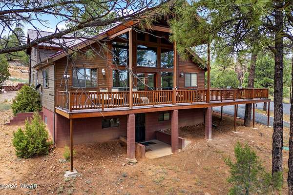 7.9 Acres of Land with Home for Sale in Overgaard, Arizona