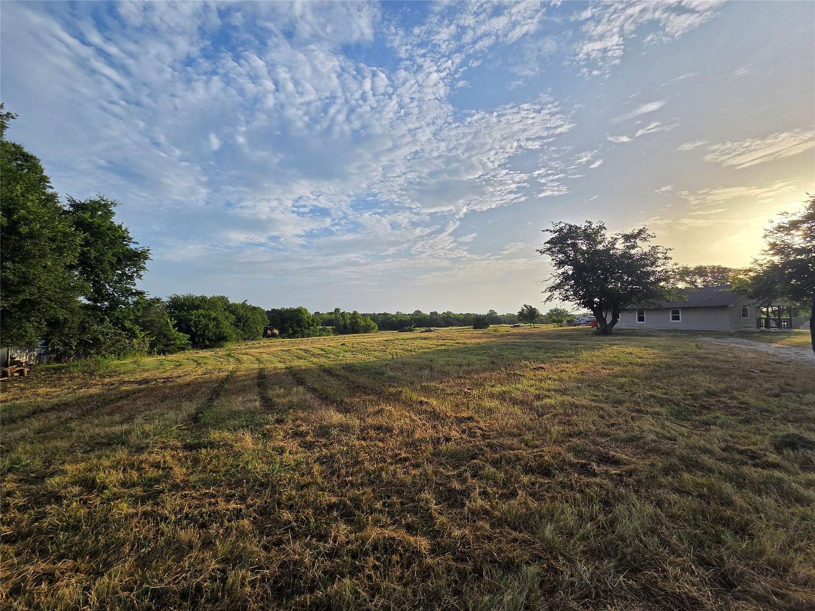 3.44 Acres of Land with Home for Lease in Quinlan, Texas