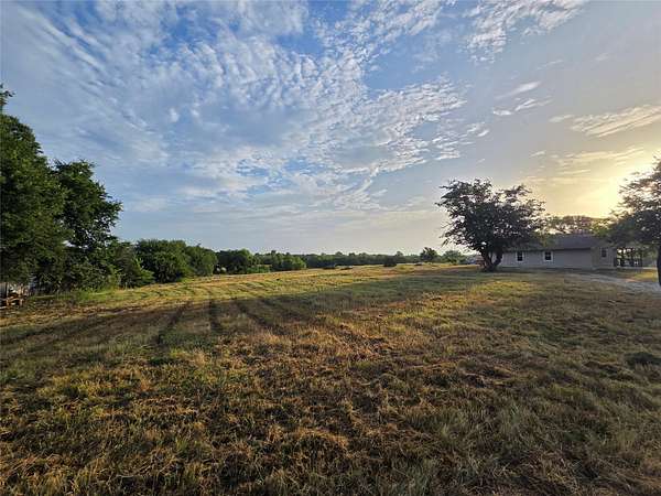 3.44 Acres of Land with Home for Lease in Quinlan, Texas