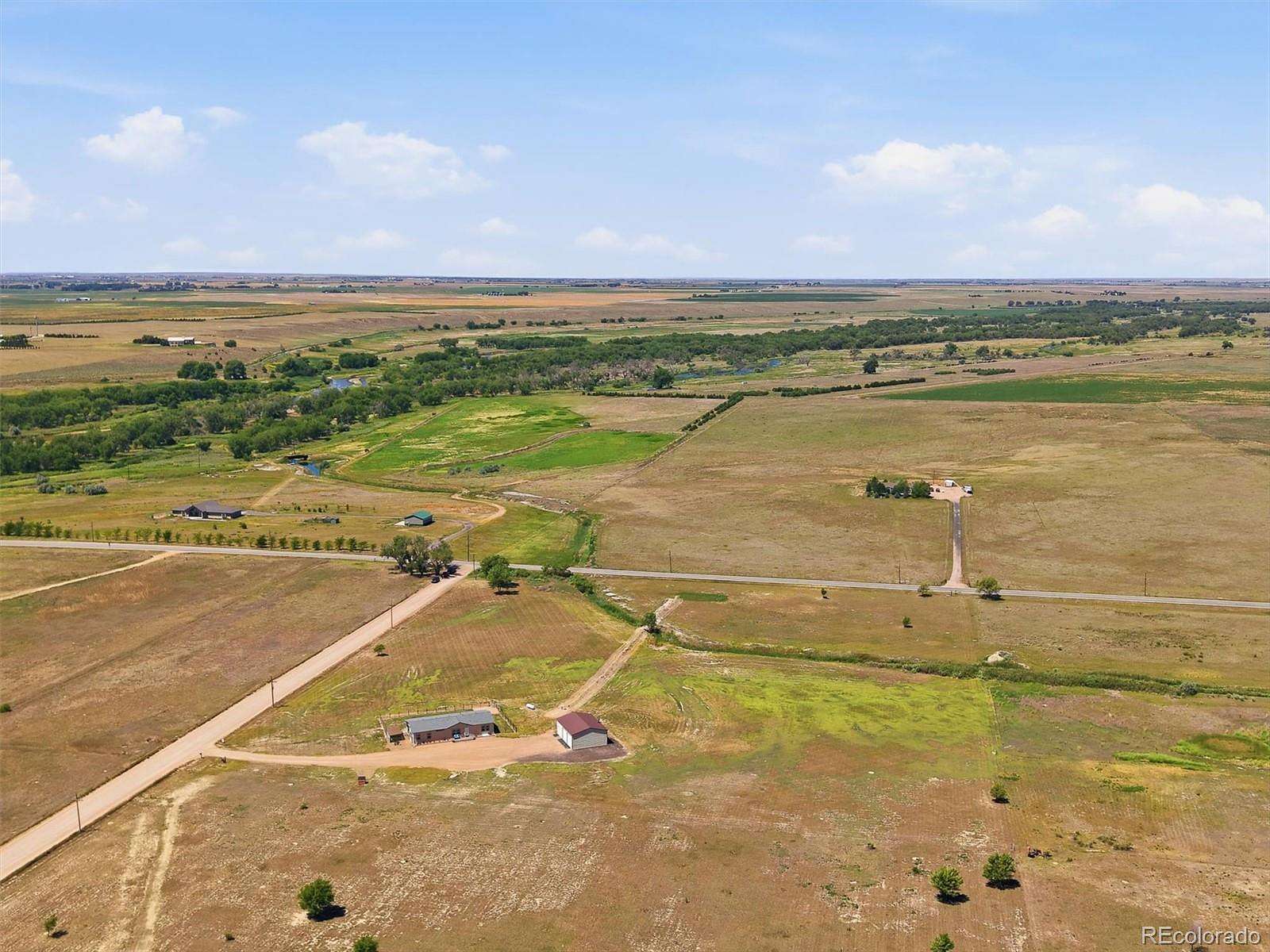9.83 Acres of Land with Home for Sale in Weldona, Colorado