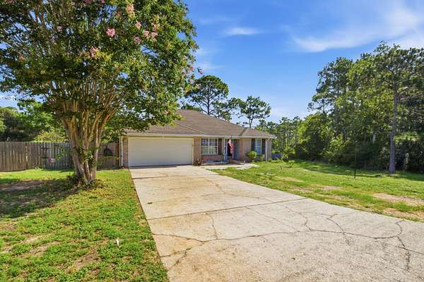 2.39 Acres of Land with Home for Sale in Navarre, Florida