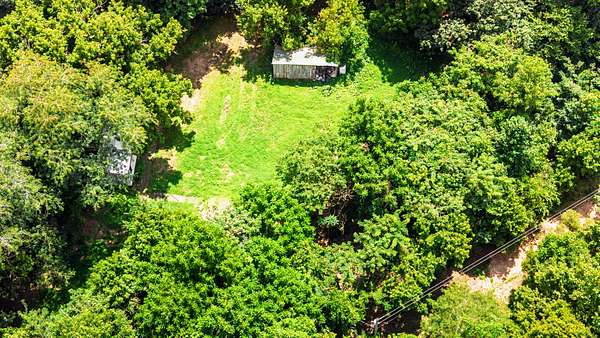 7.5 Acres of Land with Home for Sale in Cumberland City, Tennessee