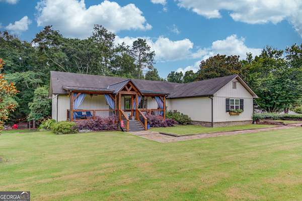 6.55 Acres of Land with Home for Sale in Snellville, Georgia