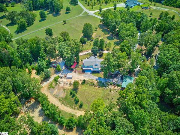 4.7 Acres of Land with Home for Sale in Taylors, South Carolina