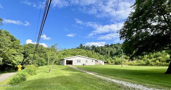 7.5 Acres of Land with Home for Sale in Oneida, Tennessee