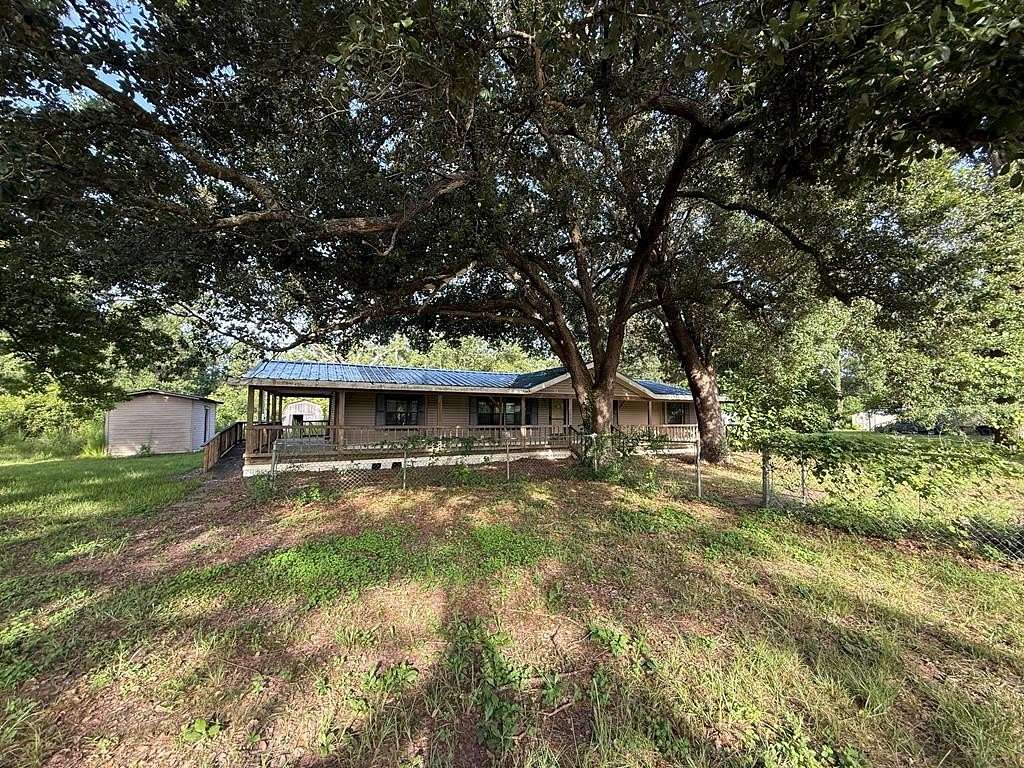 2.28 Acres of Land with Home for Sale in Buna, Texas