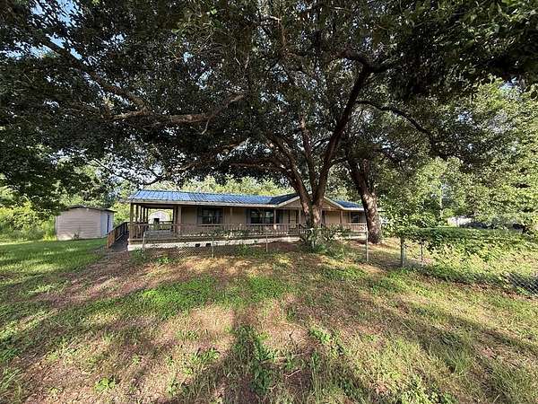 2.28 Acres of Land with Home for Sale in Buna, Texas