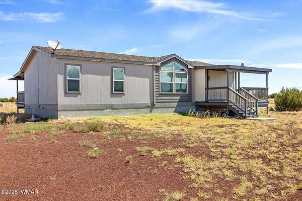 6.44 Acres of Land with Home for Sale in Concho, Arizona