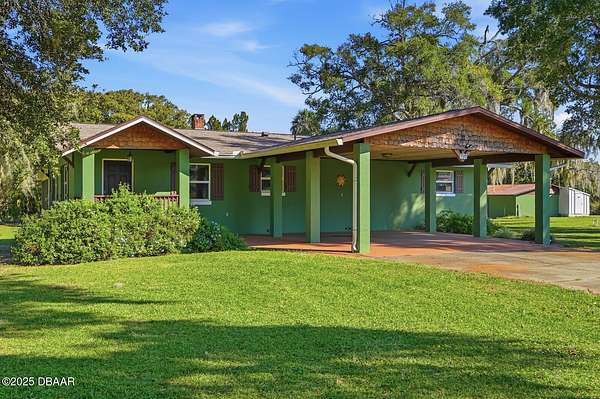 3 Acres of Land with Home for Sale in Oak Hill, Florida