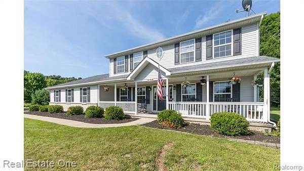 2.1 Acres of Land with Home for Sale in Handy Township, Michigan