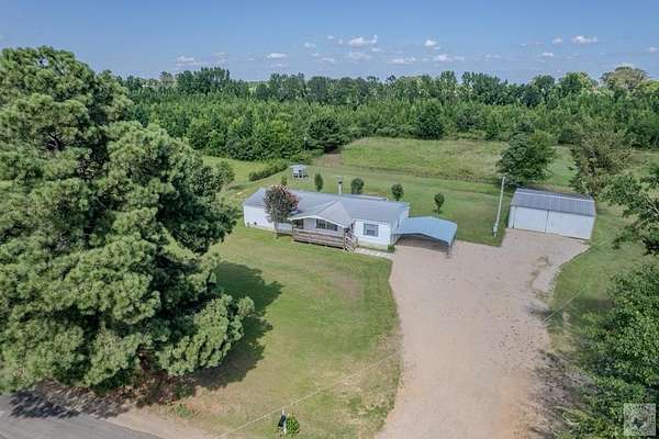 5 Acres of Land with Home for Sale in Fouke, Arkansas