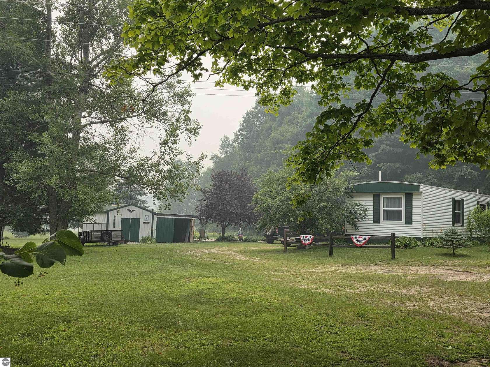 10.6 Acres of Land with Home for Sale in South Boardman, Michigan