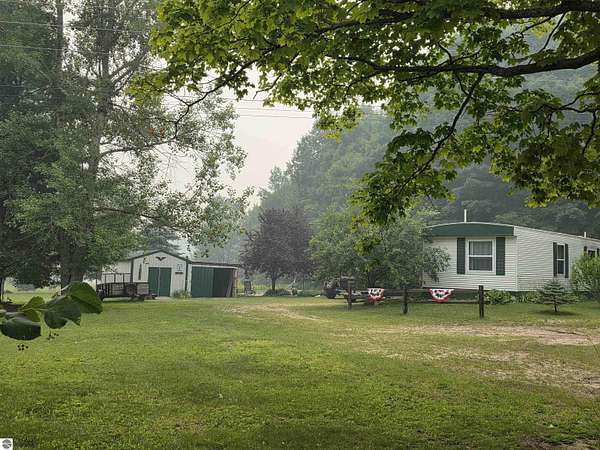 10.6 Acres of Land with Home for Sale in South Boardman, Michigan