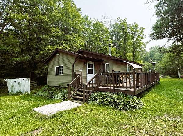 21.2 Acres of Recreational Land with Home for Sale in Hawkins, Wisconsin