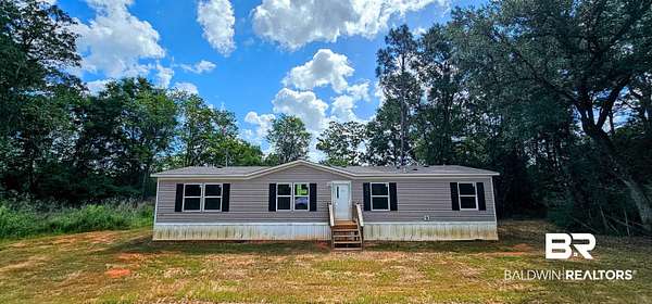 5.13 Acres of Land with Home for Sale in Robertsdale, Alabama
