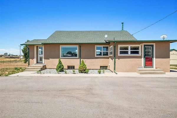 2.34 Acres of Land with Home for Sale in Keenesburg, Colorado