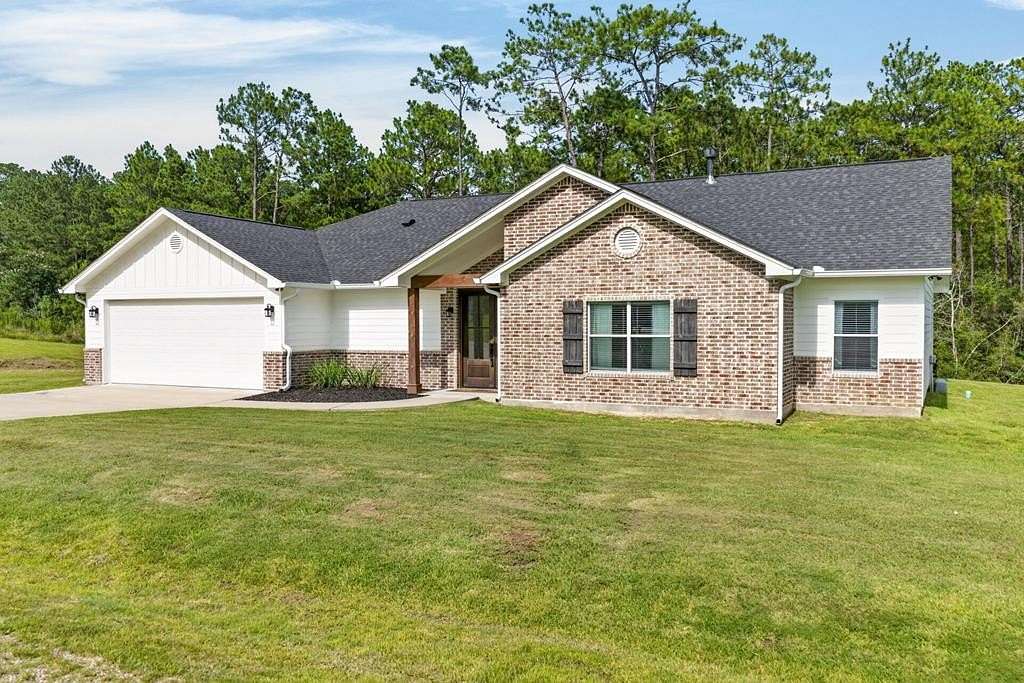 2.6 Acres of Land with Home for Sale in Brookeland, Texas