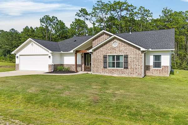 2.6 Acres of Land with Home for Sale in Brookeland, Texas
