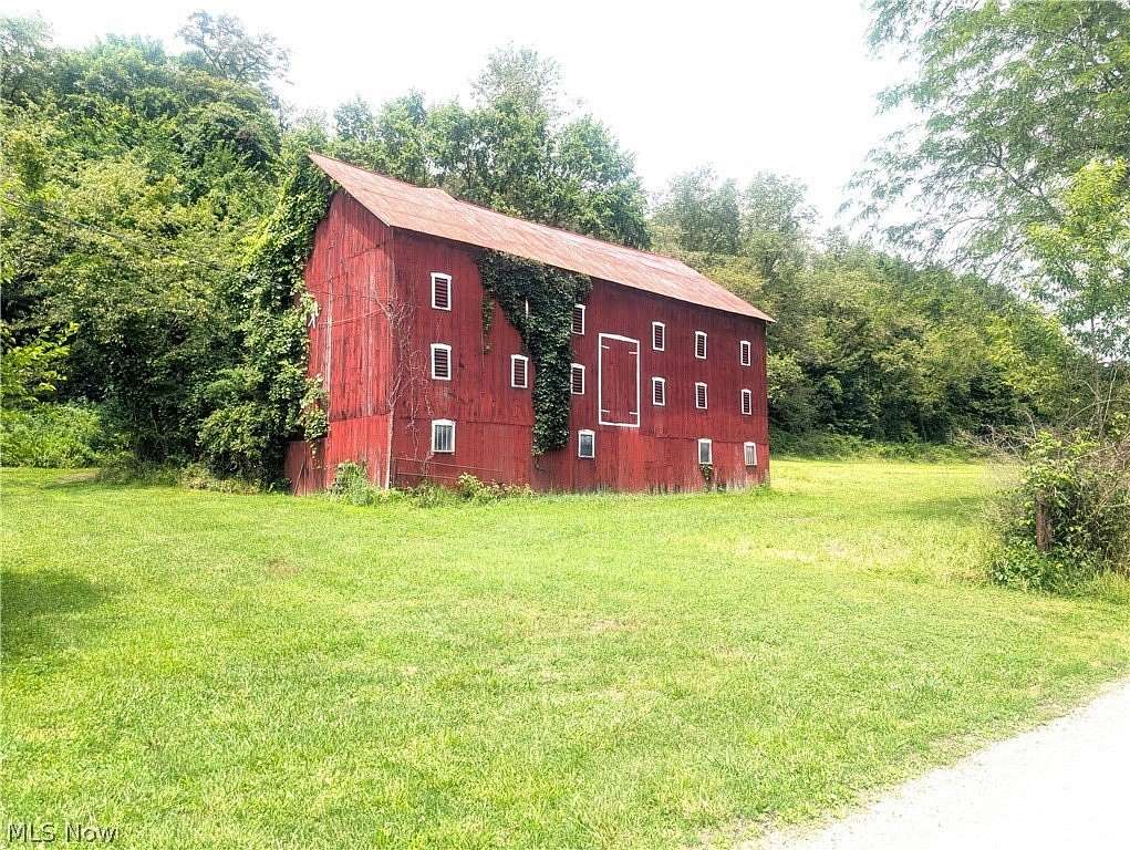4.6 Acres of Land with Home for Auction in Uhrichsville, Ohio