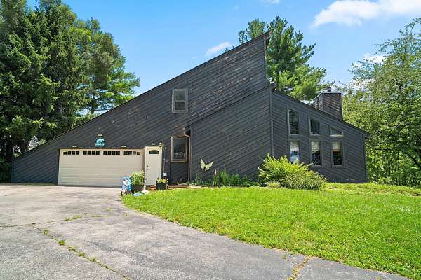 8.9 Acres of Land with Home for Sale in Winchester, Kentucky