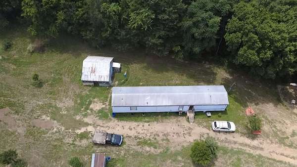 14.4 Acres of Recreational Land with Home for Sale in Parks, Arkansas
