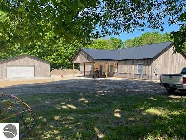 6 Acres of Land with Home for Sale in Buckley, Michigan