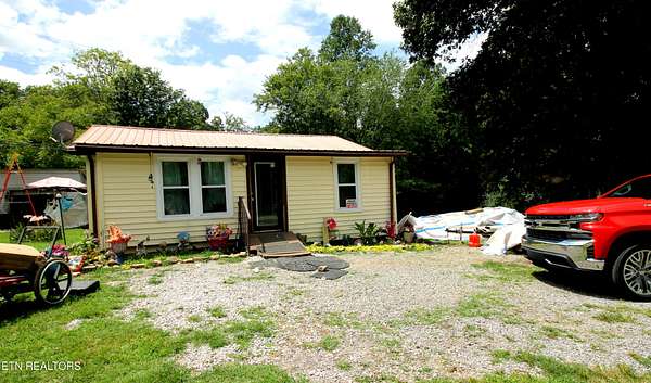 1.5 Acres of Land with Home for Sale in Lancing, Tennessee