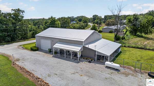 59.8 Acres of Land with Home for Sale in Deepwater, Missouri