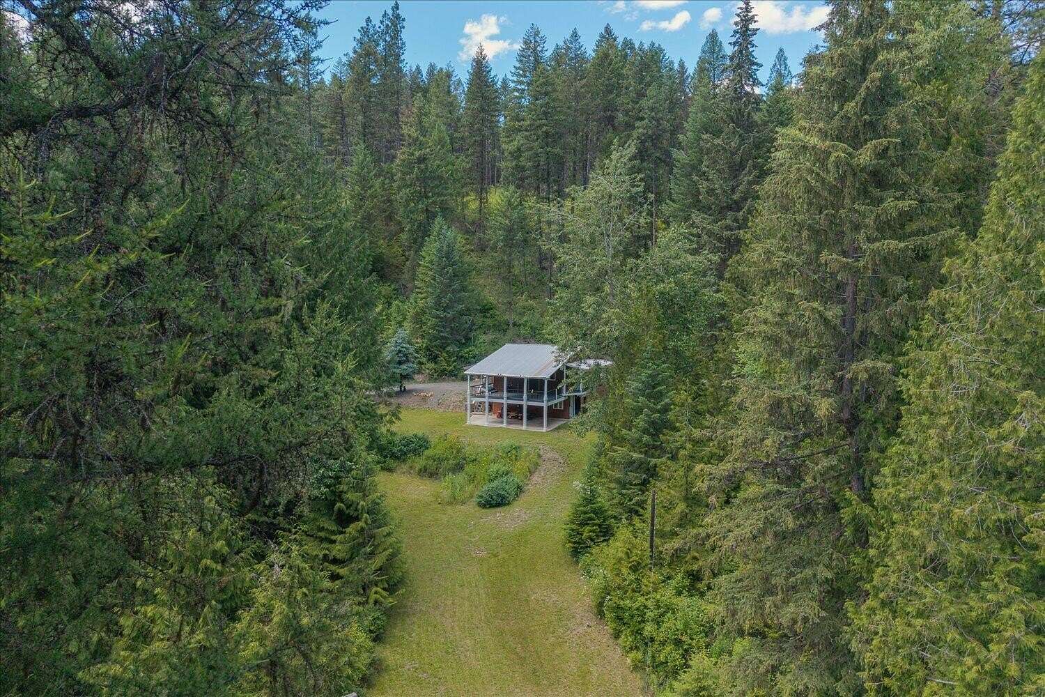 15.1 Acres of Recreational Land with Home for Sale in Kettle Falls, Washington