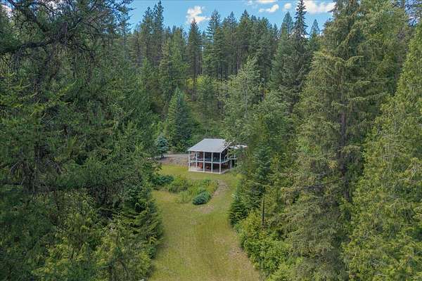 15.1 Acres of Recreational Land with Home for Sale in Kettle Falls, Washington