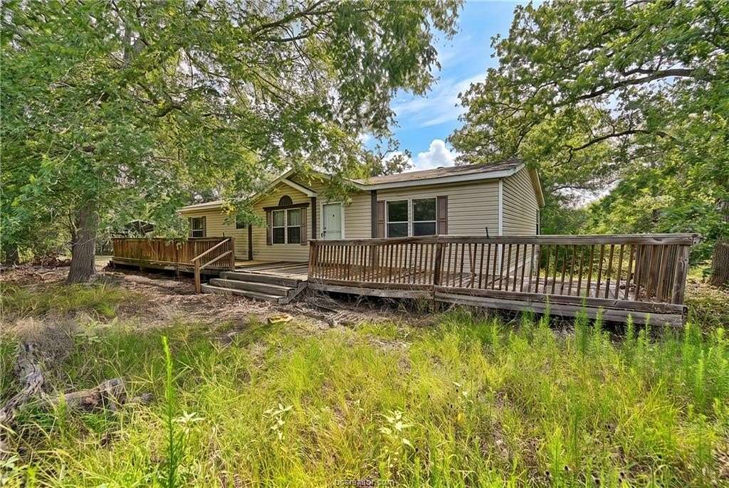 1.5 Acres of Land with Home for Sale in Somerville, Texas