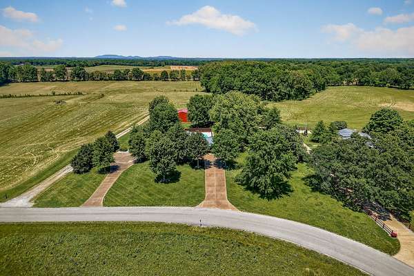 31.3 Acres of Land with Home for Sale in Morrison, Tennessee