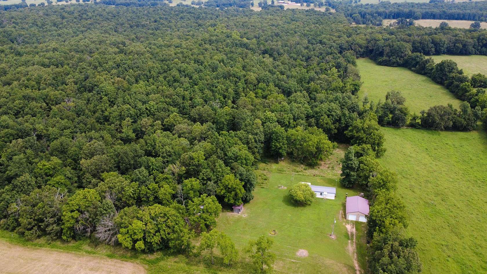 50 Acres of Recreational Land with Home for Sale in Alton, Missouri