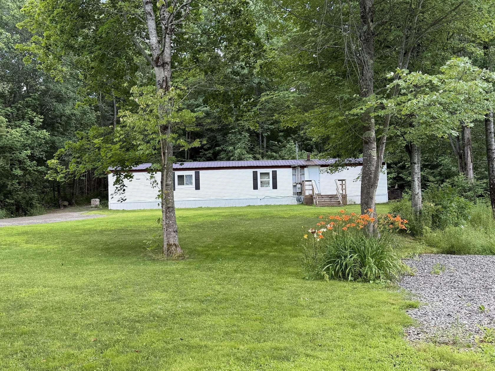 2.28 Acres of Land with Home for Sale in Sangerville, Maine