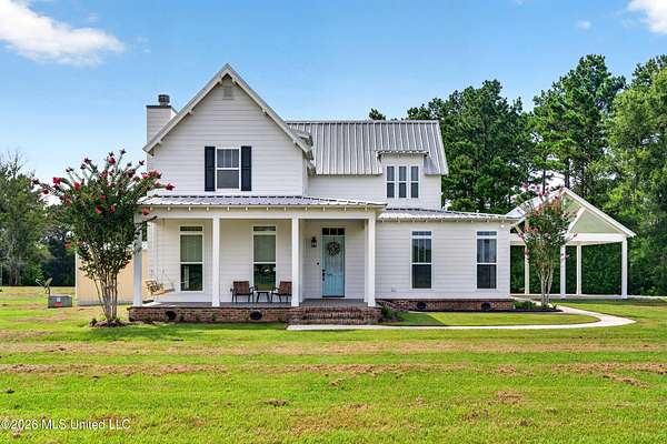 12.8 Acres of Land with Home for Sale in Carriere, Mississippi