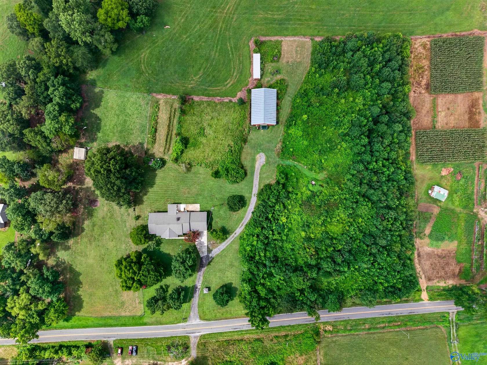 4.69 Acres of Land with Home for Sale in Albertville, Alabama