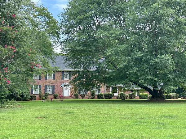 10.9 Acres of Land with Home for Sale in Florence, Alabama